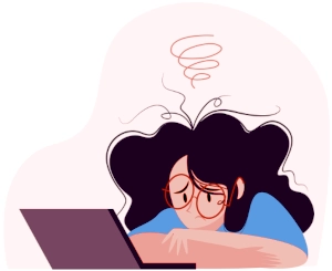 Someone sitting in front of a laptop, looking stressed.